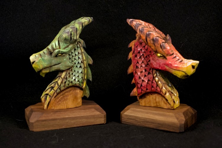 Wood Carving of two dragons. Done in Basswood with Walnut Bases, and finished with oil paint.